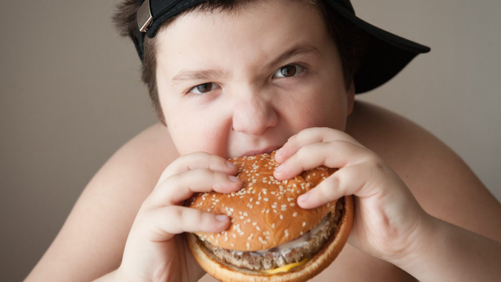 kid-eating-unhealthy-foods