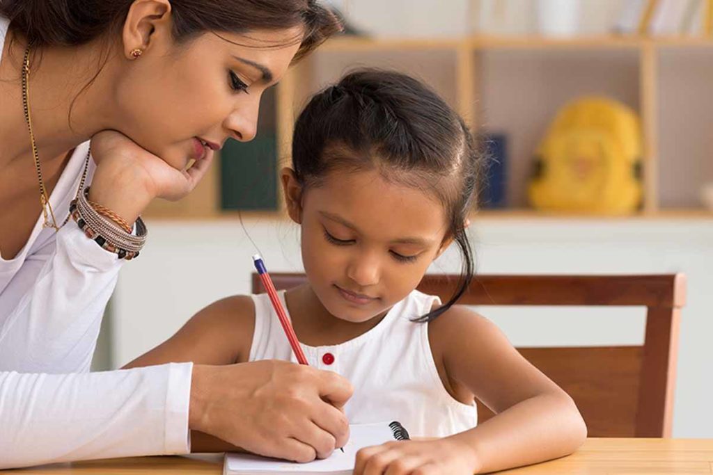 mother_help_child_to_write