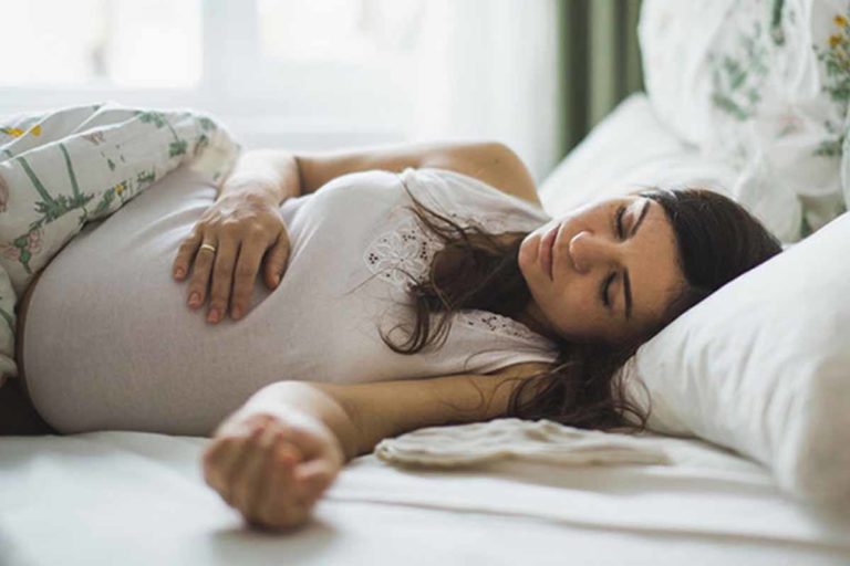 pregnant-mother-on-bed