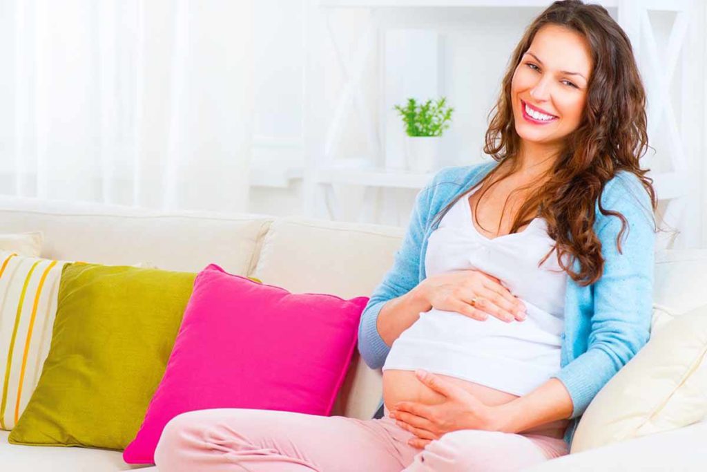pregnant-mother-on-sofa